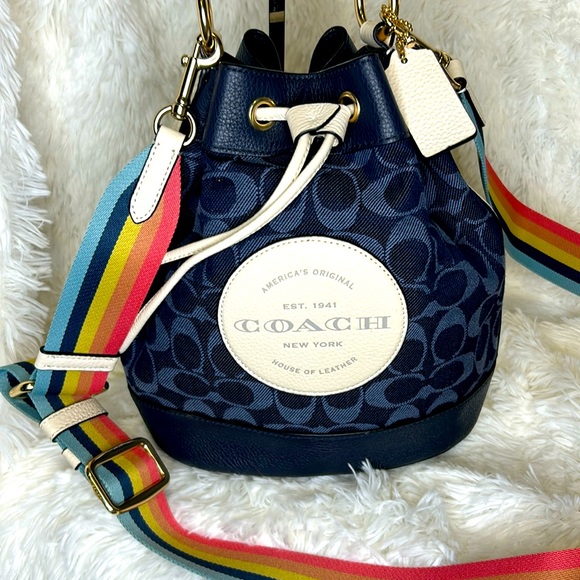 Coach Handbags - Coach Dempsey Denim Rainbow Drawstring Bucket Bag EUC Gold tone hardware